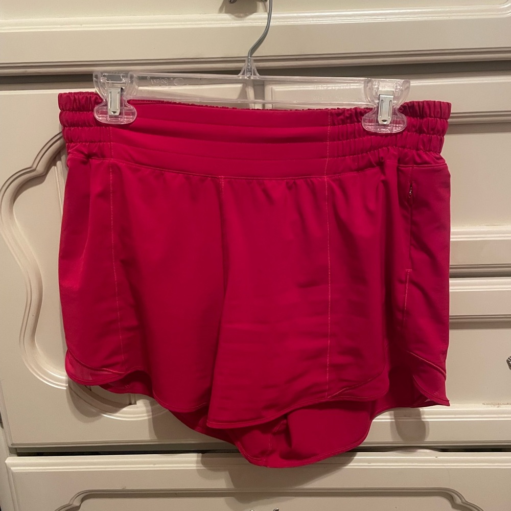 Barley worn Red Lululemon 4 inch high waisted Hotty Hots shorts.